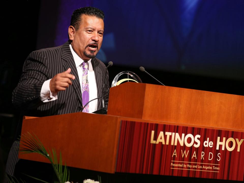 PepsiCo executive Richard Montanez accepts the Inspiration Award onstage at the '2014 Latinos De Hoy Awards'