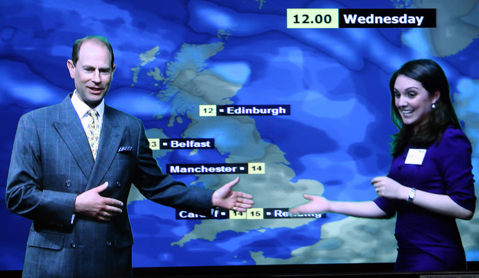 The Earl of Wessex learns how to present the weather with ITV's Laura Tobin and students of the Department of Meteorology during a visit to the University of Reading in Berkshire.   (Photo by Steve Parsons/PA Images via Getty Images)