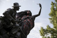<p>A statue depicting a Confederate soldier in Piedmont Park in Atlanta is vandalized with spray paint Monday, Aug. 14, 2017, from protesters who marched through the city last night to protest the weekend violence in Charlottesville, Va. (Photo: David Goldman/AP) </p>