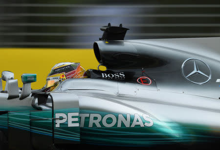 Formula One - F1 - Australian Grand Prix - Melbourne, Australia - 24/03/2017 Mercedes driver Lewis Hamilton of Britain powers around the Melbourne circuit during the second practice session. REUTERS/Jason Reed