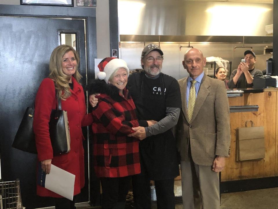 Greater Newport Chamber of Commerce Executive Director Erin Donoval Boyle, outgoing Mayor Jeanne-Marie Napolitano and state Sen. Lou DiPalma visit Cru Cafe to promote the annual Holidays by the Sea program.