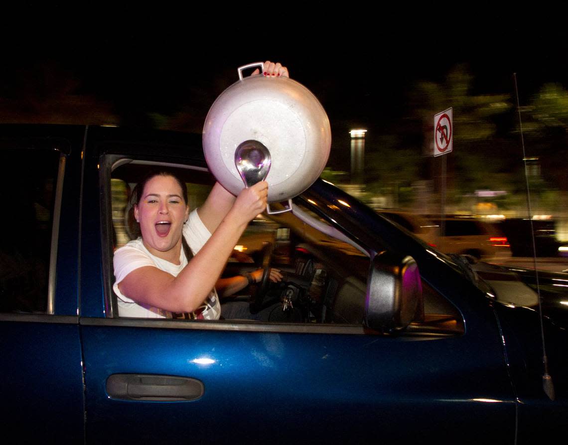 Heat fans crazy about the team’s championship win bring out the pots and pans in celebration at La Carreta in West Miami-Dade.