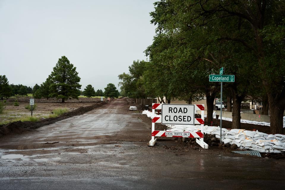 Gunman Ally, a dirt road off of Copeland Lane, was closed to all but local traffic on Aug. 15, 2022. A flash flood warning was issued in the area by the National Weather Service.