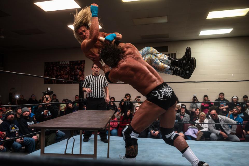 At IWR 27-Vengenance, TNA Superstar Nic Nemeth, formerly known as WWE's Dolph Ziggler, gets chokeslammed through a table by IWR Superstar Thomas Latimer.