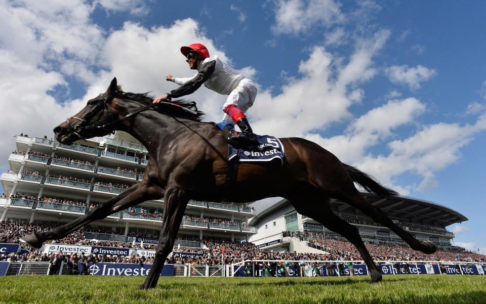 Horse Racing - Investec Derby Festival - Epsom Racecourse - 6/6/15 Frankie Dettori on Golden Horn celebrates as he wins the 4:30 Investec Derby Reuters  - REUTERS