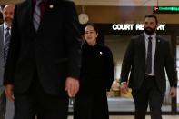 Huawei CFO Meng leaves B.C. Supreme Court during her extradition hearing in Vancouver