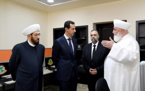 President Bashar al-Assad meeting with Syria's top Muslim cleric Ahmad Badreddin Hassoun - Credit: &nbsp;AFP