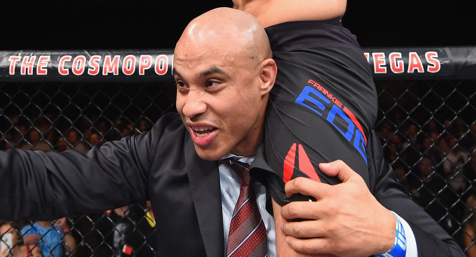 Manager Ali Abdelaziz hoists Frankie Edgar after a victory over Chad Mendes in 2015. (Getty Images)