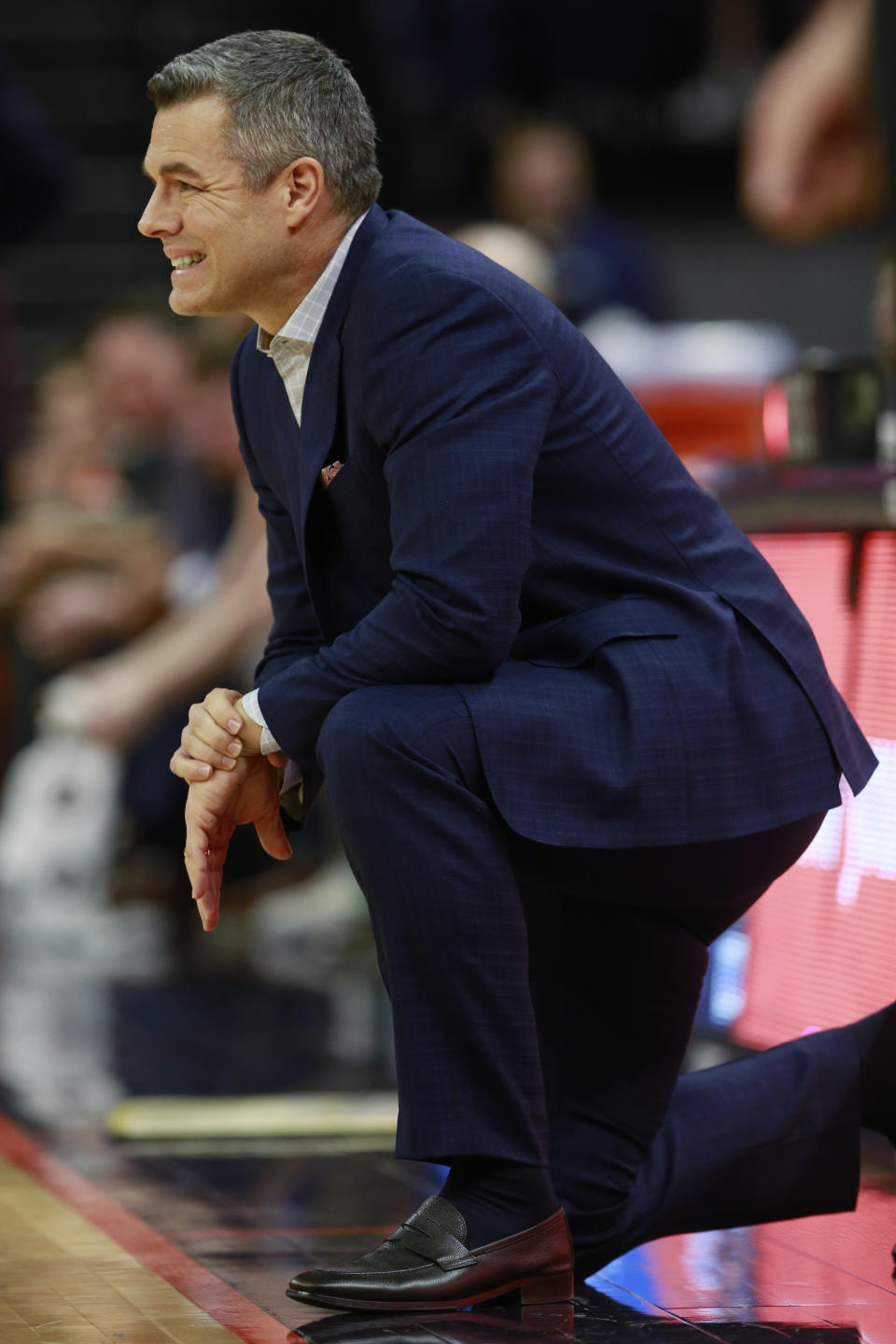 Virginia head coach Tony Bennett watches play during the first half of an NCAA college basketball game against Syracuse in Charlottesville, Va., Saturday, Jan. 11, 2020. (AP Photo/Steve Helber)
