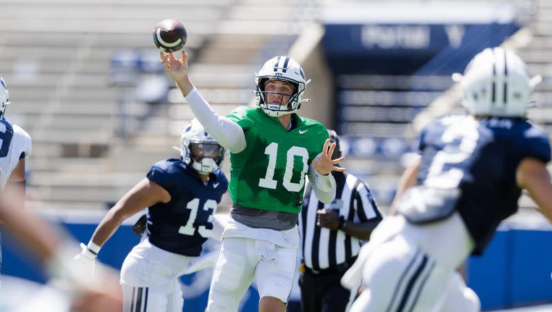 BYU quarterback Kedon Slovis throws a pass during a team scrimmage at LaVell Edwards Stadium in Provo on Saturday, Aug. 12, 2023.