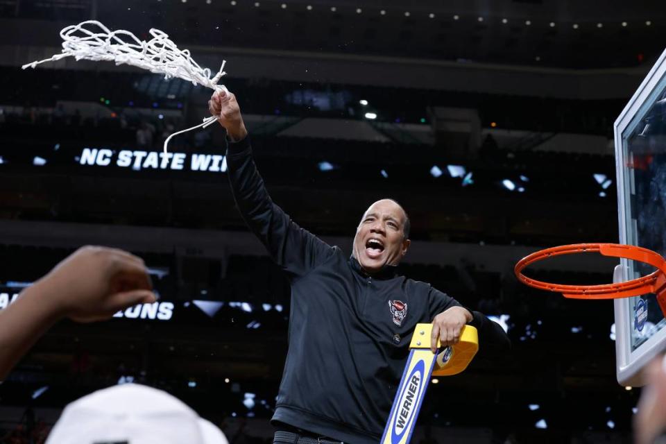 N.C. State’s head coach Kevin Keatts waves the net after after N.C. State’s 76-64 victory over Duke in their NCAA Tournament Elite Eight matchup at the American Airlines Center in Dallas, Texas, Sunday, March 31, 2024.