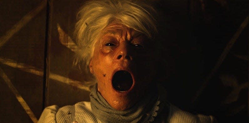 An old woman (Meg Foster) has some freaky things going on inside her in the horror film "The Accursed."