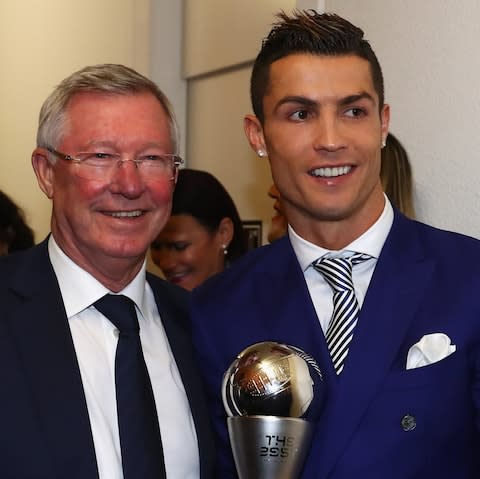 Cristiano Ronaldo of Portugal and Real Madrid poses with his The Best FIFA Men's Player Award next to Sir Alex Ferguson during The Best FIFA Football Awards at TPC Studio on January 9, 2017 in Zurich - Credit: Getty Images