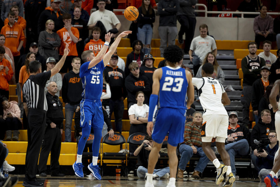 Creighton guard Baylor Scheierman (55) shoots a three point shot in the second half of an NCAA college basketball game against Oklahoma State, Thursday, Nov. 30, 2023, in Stillwater, Okla. (AP Photo/Mitch Alcala)