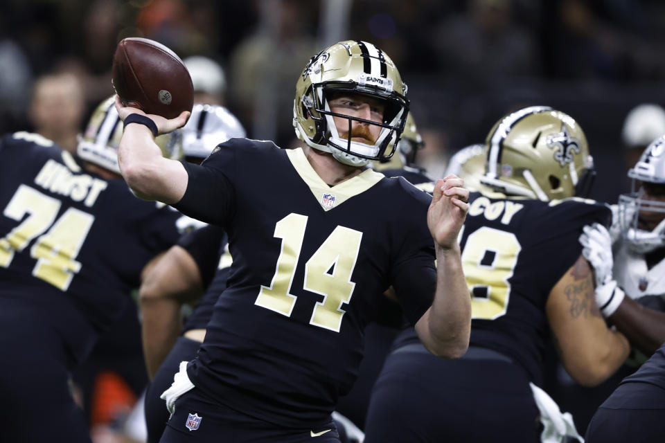 New Orleans Saints quarterback Andy Dalton (14) throws a pass during the first half of an NFL football game against the Las Vegas Raiders Sunday, Oct. 30, 2022, in New Orleans. (AP Photo/Butch Dill)