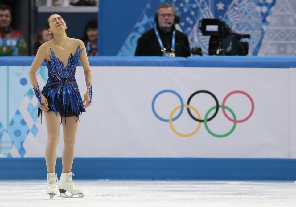 Mao Asada of Japan reacts after completing her routine in the women's free skate figure skating finals at the Iceberg Skating Palace during the 2014 Winter Olympics, Thursday, Feb. 20, 2014, in Sochi, Russia. (AP Photo/Ivan Sekretarev)