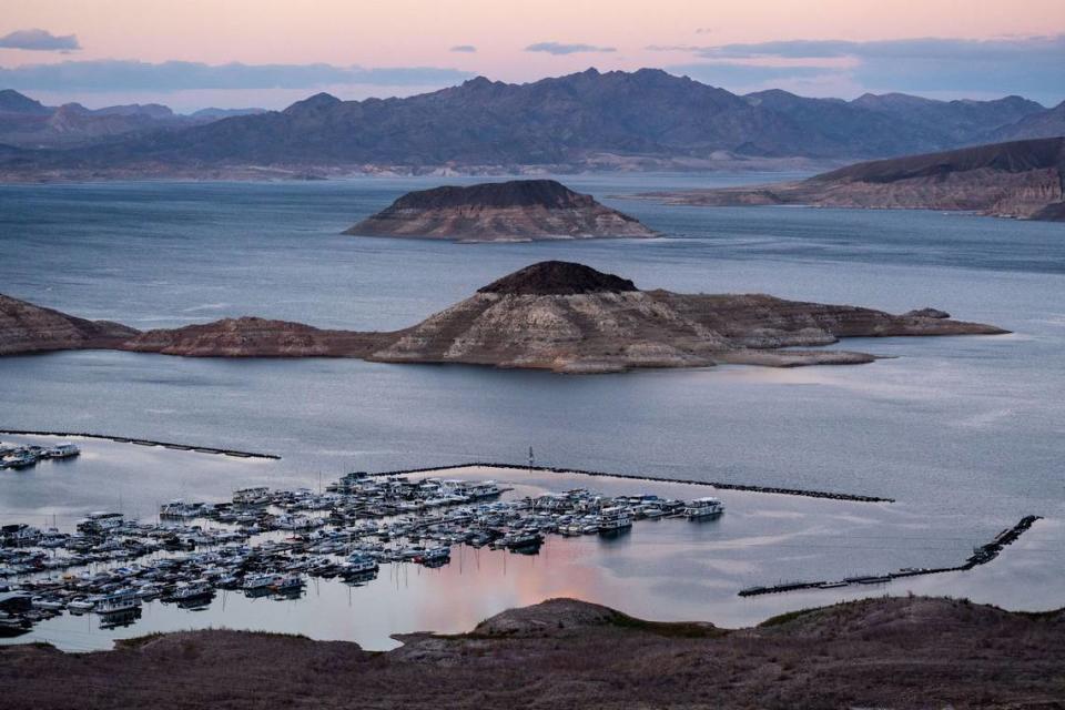 A high-water mark or bathtub ring is visible on the shoreline.at the Las Vegas Boat Harbor & Lake Mead Marina in February 2022.