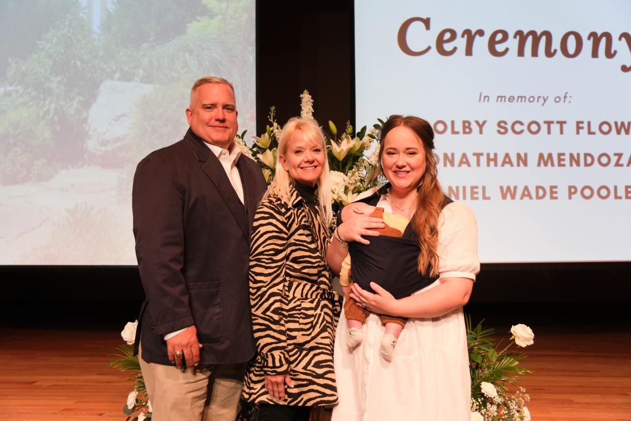 Scott and Brenda Flow with his sister Cassidy Flow Beakley honor Colby Scott Flow Friday at a student memorial service at West Texas A&M in Canyon.