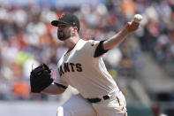 San Francisco Giants' Alex Wood pitches against the Pittsburgh Pirates during the first inning of a baseball game in San Francisco, Sunday, July 25, 2021. (AP Photo/Jeff Chiu)