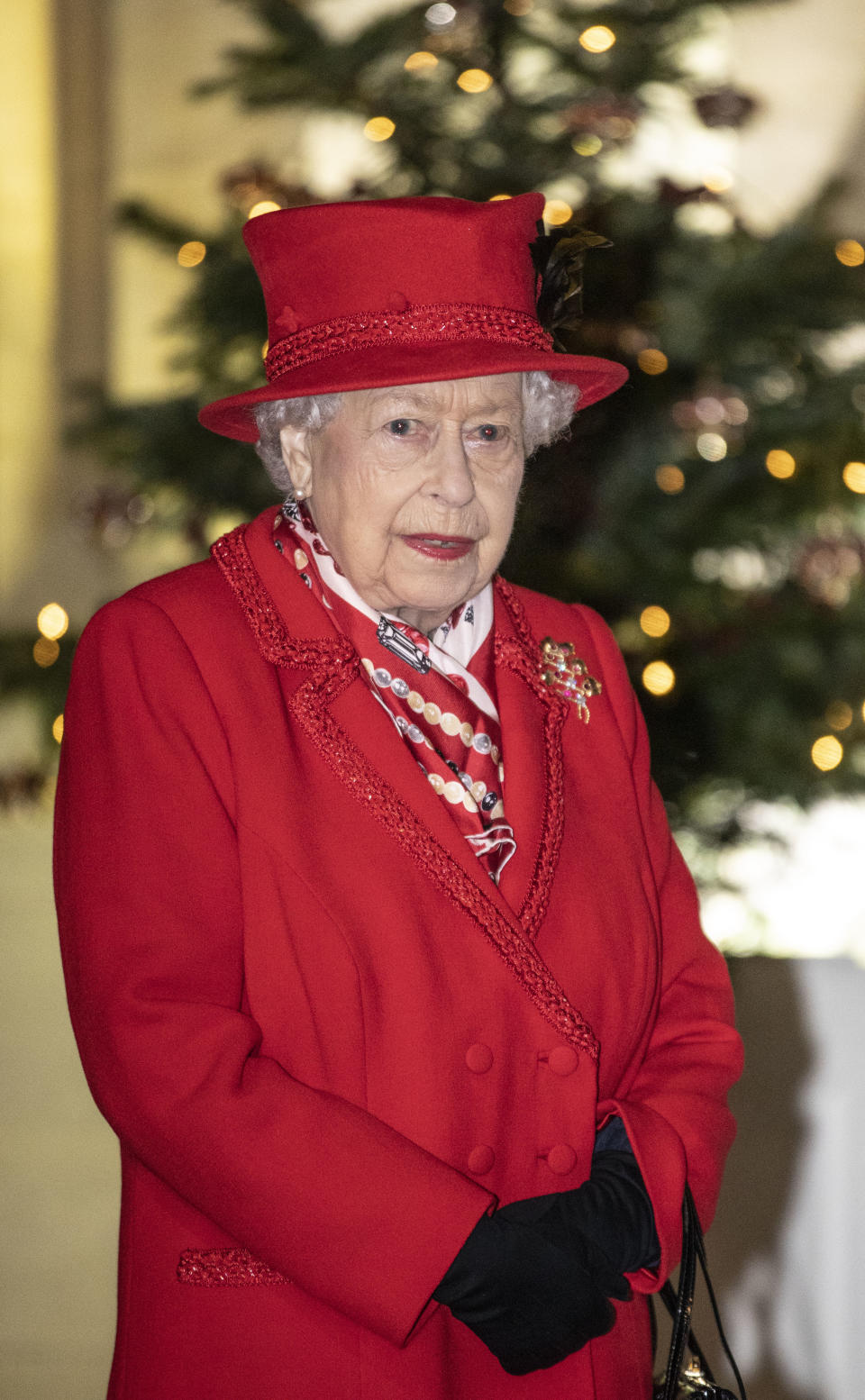 WINDSOR, ENGLAND - DECEMBER 08: Queen Elizabeth II thanks volunteers and key workers at Windsor Castle on December 08, 2020 in Windsor, England. The Queen and members of the royal family gave thanks to local volunteers and key workers for their work in helping others during the coronavirus pandemic and over Christmas at Windsor Castle in what was also the final stop for the Duke and Duchess of Cambridge on their tour of England, Wales and Scotland. (Photo by Richard Pohle - WPA Pool/Getty Images)