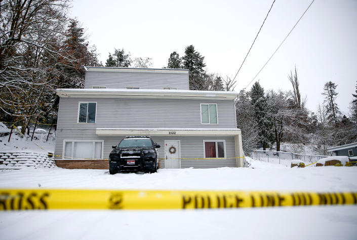 Moscow Police monitor the residence where four University of Idaho students were killed in Moscow, Idaho, on Nov. 30, 2022.  (Lindsey Wasson / Reuters / Alamy file)