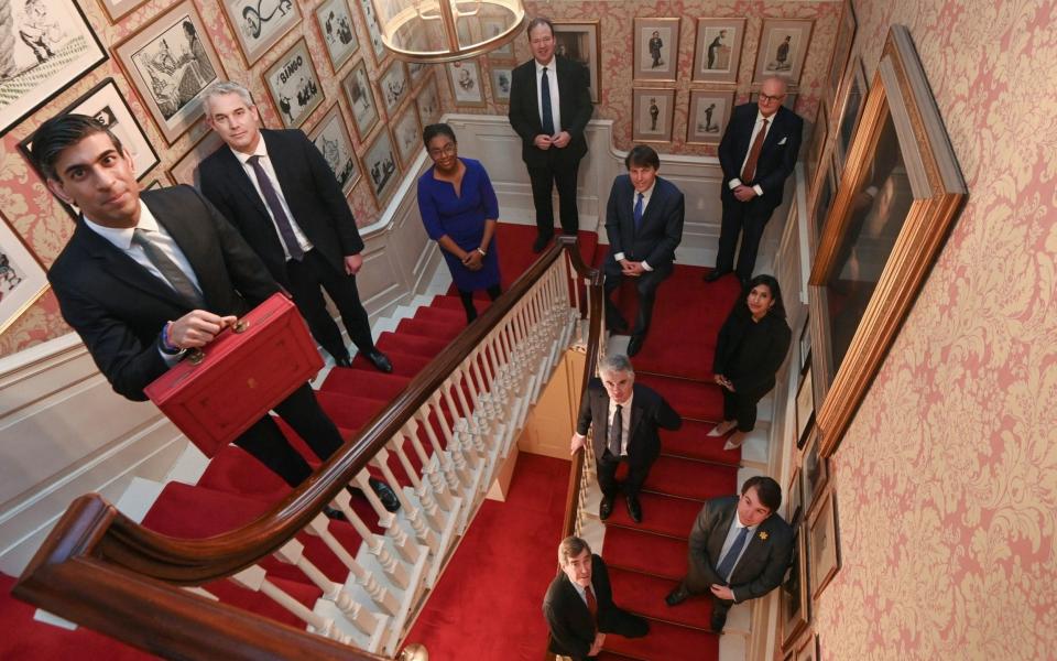 The treasury team in the stairwell - PA