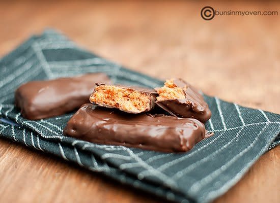 <strong>Get the <a href="http://bunsinmyoven.com/2011/10/25/homemade-butterfinger-candy-bars/" target="_hplink">Homemade Butterfingers recipe from Buns In My Oven</a></strong>    With just three ingredients, this candy bar recipe couldn't be any easier. The filling is made with a combination of melted candy corn and peanut butter. Then it's dipped in melted chocolate.