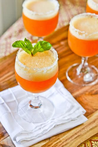 <p>This recipe includes variations for a more liquid or slushy-like consistency.</p><p>Get the recipe from <a href="http://www.fullforkahead.com/2012/01/04/peach-champage-cocktails/" rel="nofollow noopener" target="_blank" data-ylk="slk:Full Fork Ahead;elm:context_link;itc:0;sec:content-canvas" class="link ">Full Fork Ahead</a>.</p>