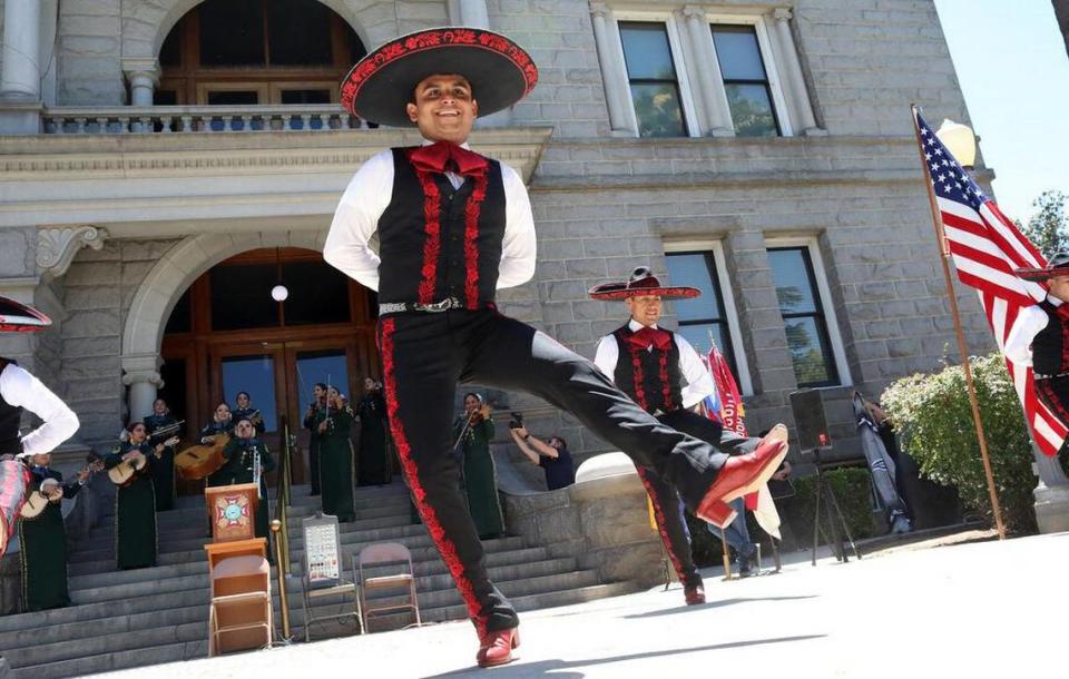 Ballet Folclórico Guadalajara performs a dance from Jalisco during a May 30, 2022 presentation in front of the Madera County Courthouse.