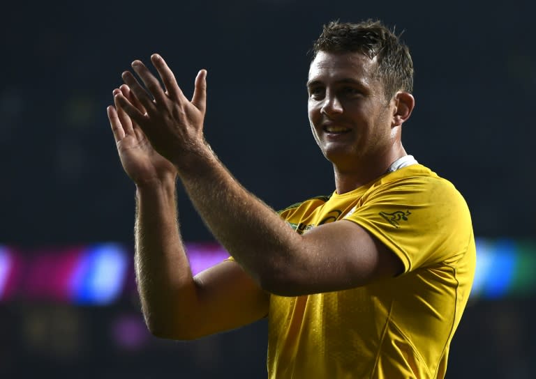 Australia's lock Dean Mumm celebrates after winning a Pool A match of the 2015 Rugby World Cup between England and Australia at Twickenham stadium, south west London, on October 3, 2015