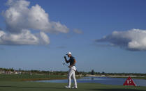 Viktor Hovland, of Norway, reacts after sinking a par on the 18th hole during the second round of the Hero World Challenge PGA Tour at the Albany Golf Club, in New Providence, Bahamas, Friday, Dec. 3, 2021.(AP Photo/Fernando Llano)