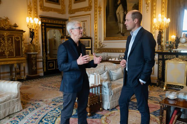 <p>Tim Cook/X</p> Tim Cook, Apple CEO, and Prince William at Windsor Castle on Thursday