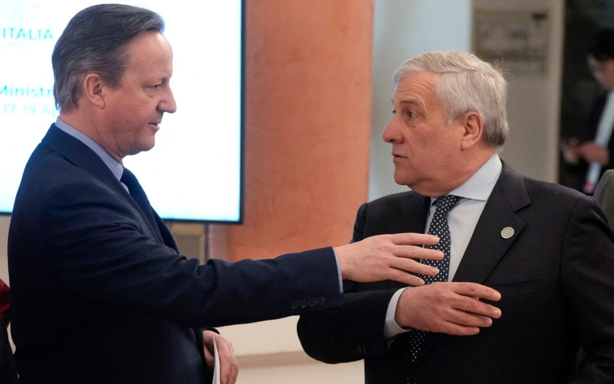 Lord Cameron (left) speaks with Italian Foreign Affairs Minister Antonio Tajani