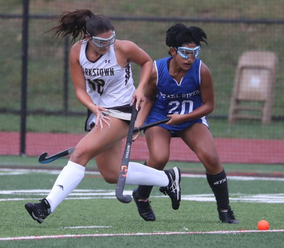 Clarkstown South's Shana Goldsmith is guarded by Pearl River's Isabella Cruz during their game at Clarkstown South Sept. 6, 2022. Clarkstown South won 9-2.
