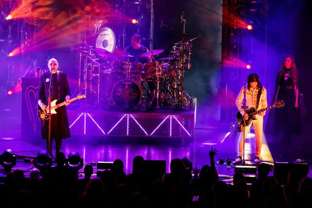 <p>Scott Legato/Getty</p> Billy Corgan (left) performing with his band, The Smashing Pumpkins, in Michigan in September 2023