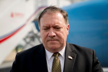 FILE PHOTO: U.S. Secretary of State Mike Pompeo pauses while speaking to members of the media following two days of meetings with Kim Yong Chol, a North Korean senior ruling party official and former intelligence chief, before boarding his plane at Sunan International Airport in Pyongyang, North Korea, July 7, 2018. Andrew Harnik/Pool/File Photo via REUTERS