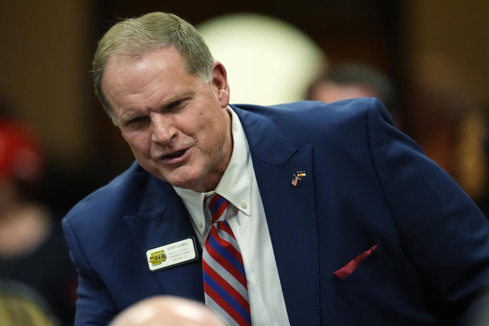 Scott James greets well-wishers before the first Republican primary debate for the 8th Congressional district seat Thursday, Jan. 25, 2024, in Fort Lupton, Colo. (AP Photo/David Zalubowski)