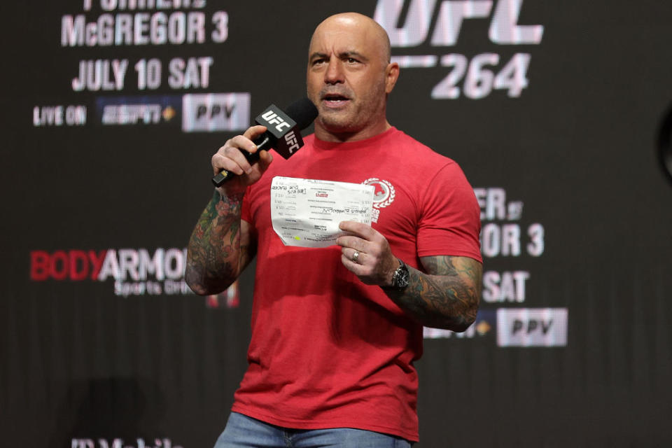 Podcaster Joe Rogan photographed at a mic at a UFC weigh-in on July 9 in Las Vegas. 