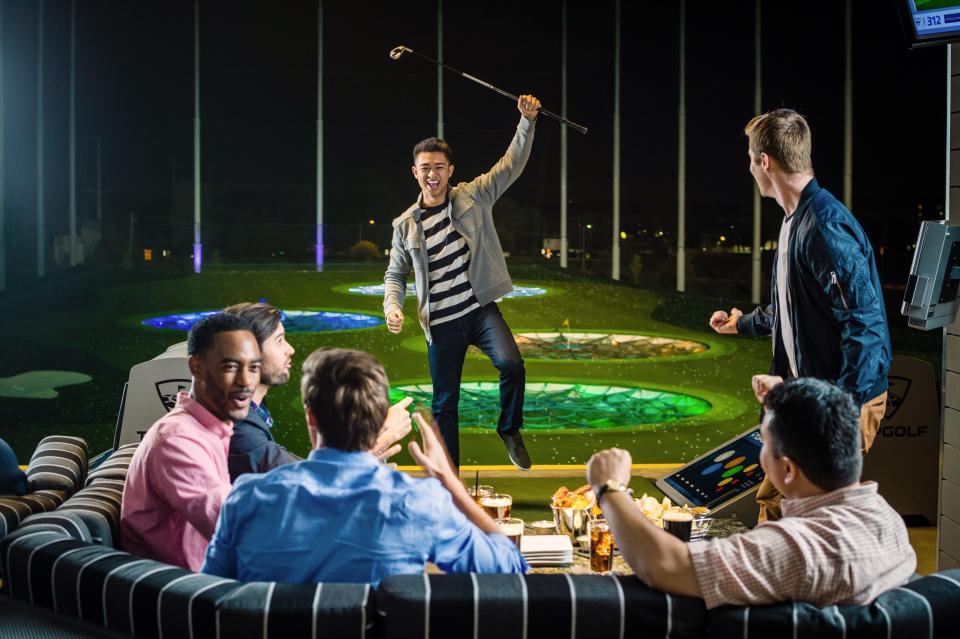 A stock image from Topgolf illustrates what the suites will look like, as well as the colorful targets on the driving range.