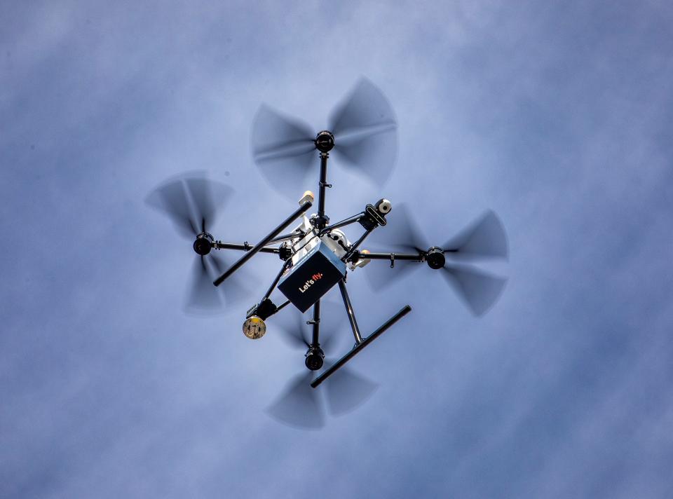 A drone test flight drops a tethered package in the parking lot of the Walmart Supercenter on Cypress Gardens Boulevard  in Winter Haven Fl  Tuesday January 24,2023.Over the past year, WalmartÕs drone program has really taken flight Walmart now operates 36 drone delivery hubs across 7 states Ð including Florida (and Winter Haven). There are nine hubs in Florida so far.Ernst Peters/The Ledger