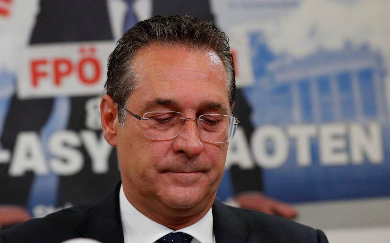 Strache appeared visibly emotional as he offered his resignation - REUTERS