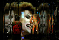 <p>A woman visits the new exhibition ‘David Bowie Is’ in Barcelona, Spain, May 24, 2017. The exhibition displays 300 objects related to the late British musician such as original costumes, photographs, music videos, instruments and albums. The exhibition will be open to public on 25 May at the Design Museum. (Photo: Toni Albir/EPA) </p>