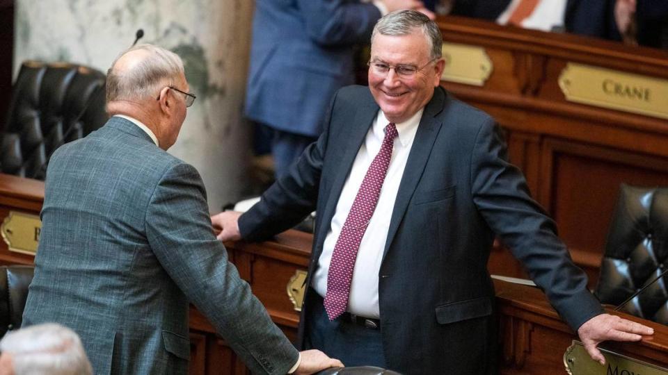 Idaho House Speaker Scott Bedke relaxes on the House floor in conversation with Rep. Marc Gibbs, R-Grace, as lawmakers wait in recess Wednesday, May 12, 2021 at the Statehouse in Boise.