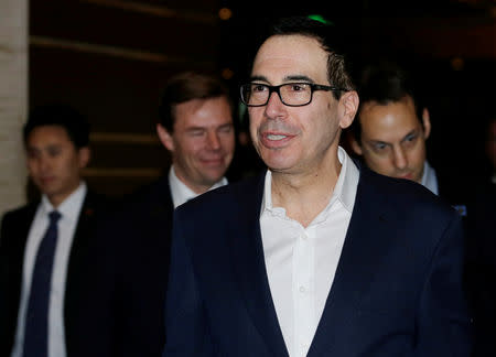 U.S. Treasury Secretary Steven Mnuchin, a member of the U.S. trade delegation to China, speaks to the media upon his arrival at a hotel in Beijing, China February 12, 2019. REUTERS/Jason Lee