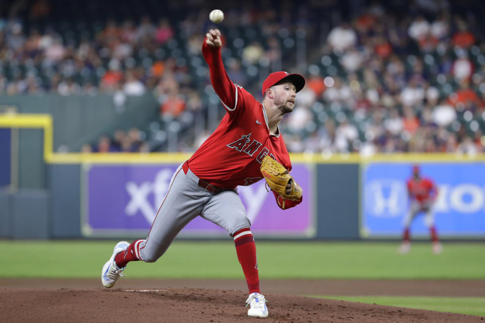 Los Angeles Angels starting pitcher Griffin Canning throws to a Houston Astros batter during the first inning of a baseball game Tuesday, May 21, 2024, in Houston. (AP Photo/Michael Wyke)