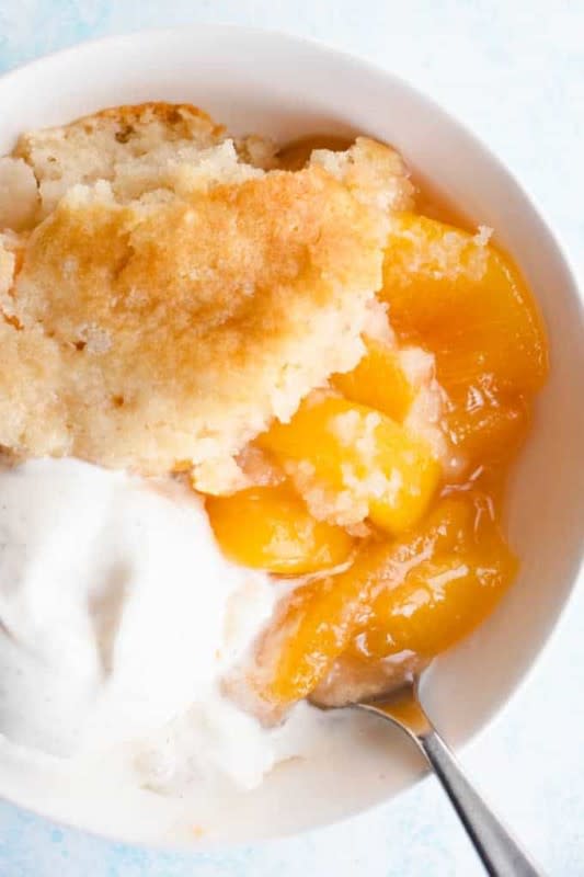 <p>House of Yumm</p><p>This classic southern dessert recipe is perfected and may even be the you’ve ever had with fresh peaches and a crispy, buttery, vanilla topping.</p><p><strong>Get the recipe: <a href="https://houseofyumm.com/peach-cobbler/" rel="nofollow noopener" target="_blank" data-ylk="slk:Peach Cobbler;elm:context_link;itc:0;sec:content-canvas" class="link ">Peach Cobbler</a></strong></p><p><strong>Related: <a href="https://parade.com/844038/felicialim/28-perfect-peach-recipes-for-summer/" rel="nofollow noopener" target="_blank" data-ylk="slk:35 Best Peach Recipes;elm:context_link;itc:0;sec:content-canvas" class="link ">35 Best Peach Recipes</a></strong></p>