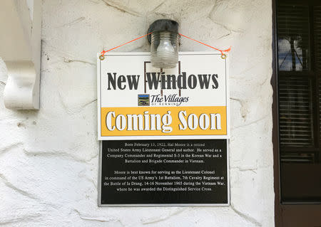 A sign posted on a older Fort Benning home announces upcoming window replacements as part of an effort to protect residents from lead paint hazards in Fort Benning, Georgia, U.S., September 10, 2018. REUTERS/Andrea Januta