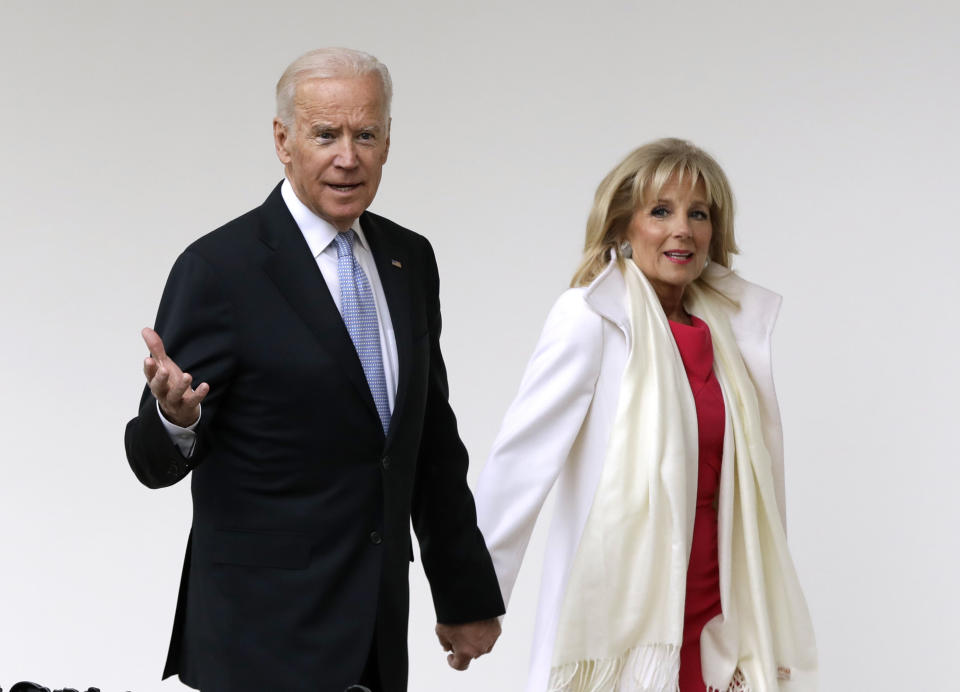 FILE - In this Jan. 20, 2017 file photo, Vice President Joe Biden and his wife Jill walk along the colonnades of the White House in Washington before the start of presidential inaugural festivities for the incoming 45th President of the United States Donald Trump. Flatiron Books said Wednesday, April 5, that it will release two books by Joe Biden and one by Jill. Joe Biden’s first book will “explore one momentous year,” 2016, when his son Beau died and he decided against running for president. The book is currently untitled and no release date was announced. (AP Photo/Evan Vucci, File)