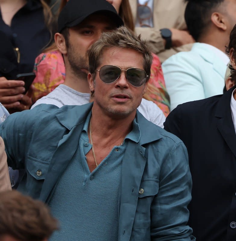 Brad Pitt watches the Wimbledon Men's Final match in London on July 16. The actor turns 60 on December 18. File Photo by Hugo Philpott/UPI