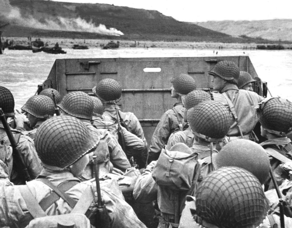 American shock troops huddle behind the protective front of a landing craft as it nears the beachhead on the Normandy coast of France (Omaha Beach) in front of Vierville-sur-Mer, June 6, 1944. (Photo by Photo12/UIG/Getty Images)American shock troops huddle behind the protective front of a landing craft as it nears the beachhead on the Normandy coast of France American shock troops huddle behind the protective front of a landing craft as it nears the beachhead on the Normandy coast of France (Omaha Beach) in front of Vierville-sur-Mer, June 6, 1944.<span class="copyright">Photo12/UIG—Getty Images</span>